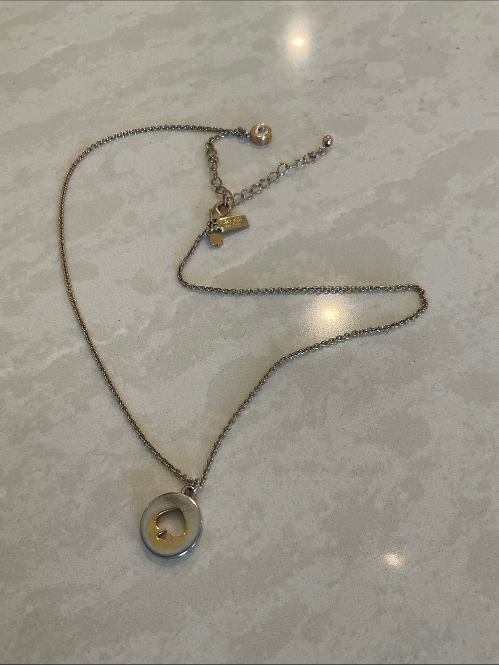 kate spade Necklace - Gold chain with “Spade”